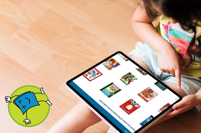 Tumblebooks logo and a child using TumbleBooks on a tablet